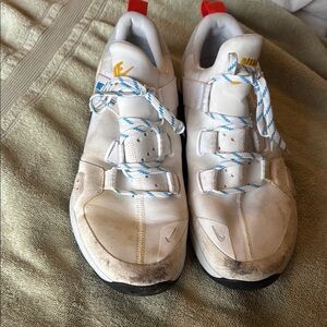 Nike White Athletic Shoes with Blue Accents